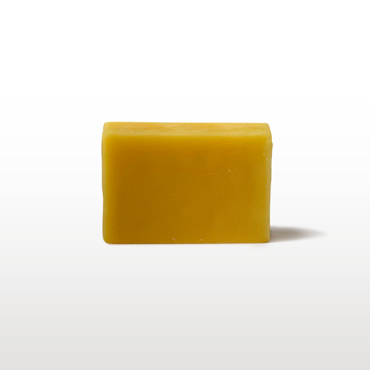 A bar of golden yellow wax vue 1